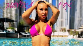 Monika Fox Poses In Pink Bikini And Swims In Pool Surrounded By Skyscrapers
