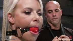 ”Tied & suspended blond trainee ravaged”