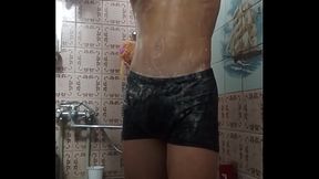 Muscle boy take shower