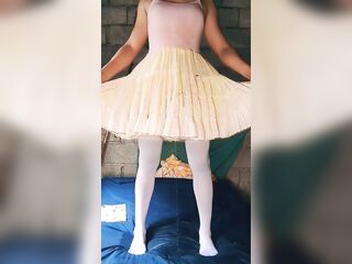 Suddenly Lengthy Piddle Standing In Couch During the time that Wearing Tutu Suit