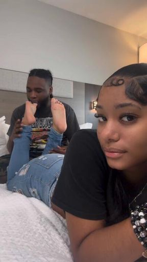 Laying on her stomach while i worship them feet