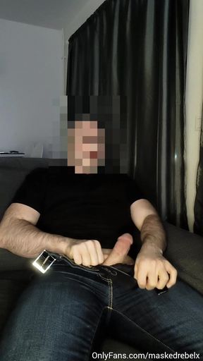 Horny man takes off his pants and starts masturbating his big cock