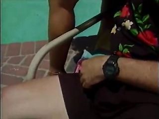 Marvelous black domme with fine bazookas lets old chap lick her twat by the pool