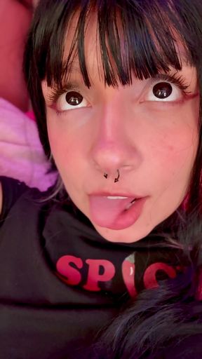 Pierced tongue sticking out