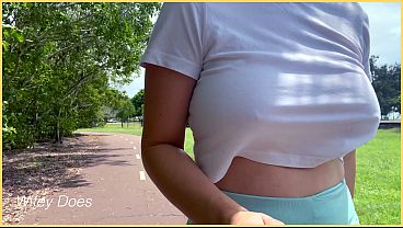 Amateur milf shows off her perfect, braless tits in public