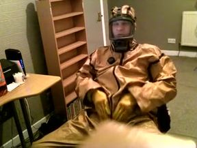 Cumming in a vintage rubber hazmat costume