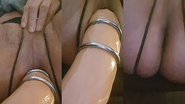 Three steel penis rings on 30 cm dildo