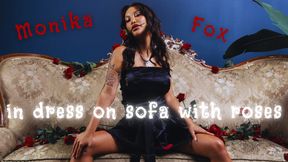 Beautiful Monika Fox In Black Dress On Sofa With Roses
