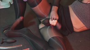 Fully body covered in layered nylon pantyhose with tight metal ring encased balls