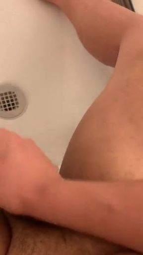 Petite Fuck-Stick Hubby Stroking while Relieving the the Sound of Water