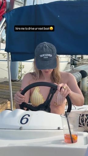 German bikini babe shows off her sexy body on a boat