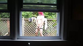 Crossdresser Jon Scarecrow getting naked outdoors to shower and masturbate in nature