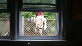 Crossdresser Jon Scarecrow getting naked outdoors to shower and masturbate in nature