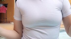 Smoking 100s wet t-shirt by the pool in the rain