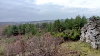 I need to piss during a hike, under the rock that looks like cock