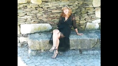 Blonde submissive bound and gagged in a red dungeon by her dominant Portuguese captor