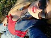 A sunny day & a gorgeous milf sunbathing in the field feeling sexy!