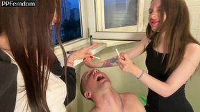 two bitchy girls smoke and humiliate a guy using his mouth as an ashtray