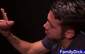 Horny teen sucks stepdads big cock through a glory hole