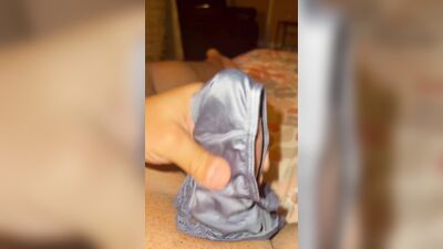 Watch this young redhead resist getting fucked hard in a blue satin thong POV