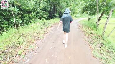 Thai teen flashes her juicy pink pussy in rice field