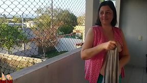 I taped my wife showing her tits on the balcony for delivery guys