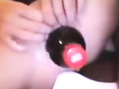 My large cunt filled with a big bottle