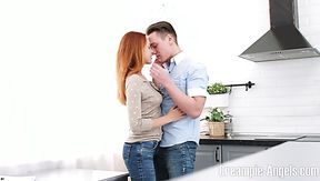 Ginger nympho Candy Red gets her treasure pussy stretched on the table