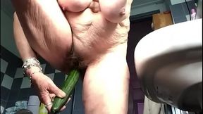 Granny fucks hairy pussy solo