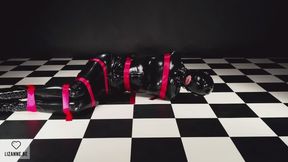 Struggling in straps in full latex