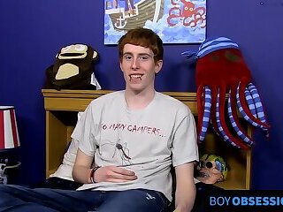 Guy with red hair gets interviewed before enjoying solo session