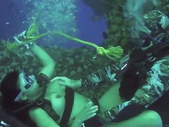 Fucking this busty cutie underwater while scuba diving