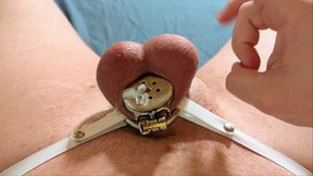 Cum in flat chastity cage from flicking balls