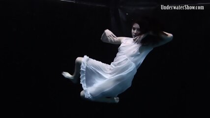 Aqua girl Andrejka underwater stripping and swimming