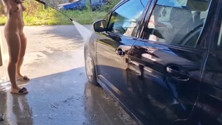 I undress while washing the car at the car wash, showing my tits and pussy in public