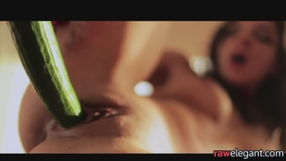 Babe orgasms while using cucumber