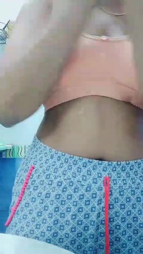 Curvy blonde woman in blue pjs pleasures herself alone