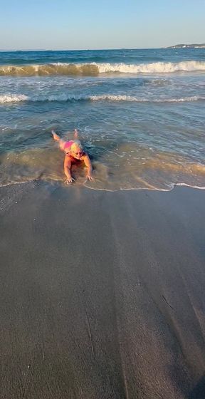 Try Not to Wet My Hair While Play with the Waves