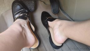 Fifi pedal pumping her SUV in loafer style mules then pink and reptile strap sandals