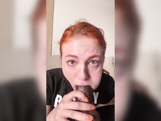 Redhead in ebony crop top and large sex-toy suck. Sub OF