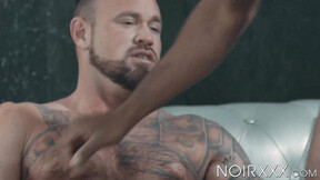 Tatted jock Michael Roman willingly endures getting banged by a ebony shaft