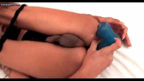 Brunette shemale enjoys big blue dildo