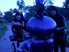 Public training of latex-clad femdom slaves gets really kinky