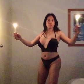 hot shemale doing her candle sexy dance and boobs out