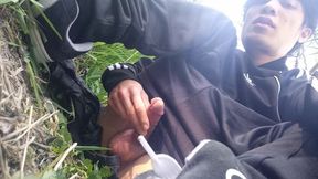 Gay boy Jon Arteen, wearing adidas tracksuit Campus sneakers, gets a hard-on outdoors