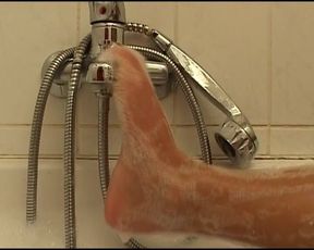Big Boobed German Slut Enjoys Solo Action in the Shower