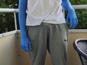 Bodypaint shark teases on balcony