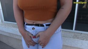 red august pee pee dancing and wetting herself on balcony