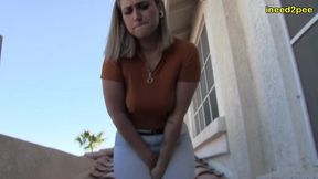 red august pee pee dancing and wetting herself on balcony