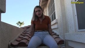 red august pee pee dancing and wetting herself on balcony